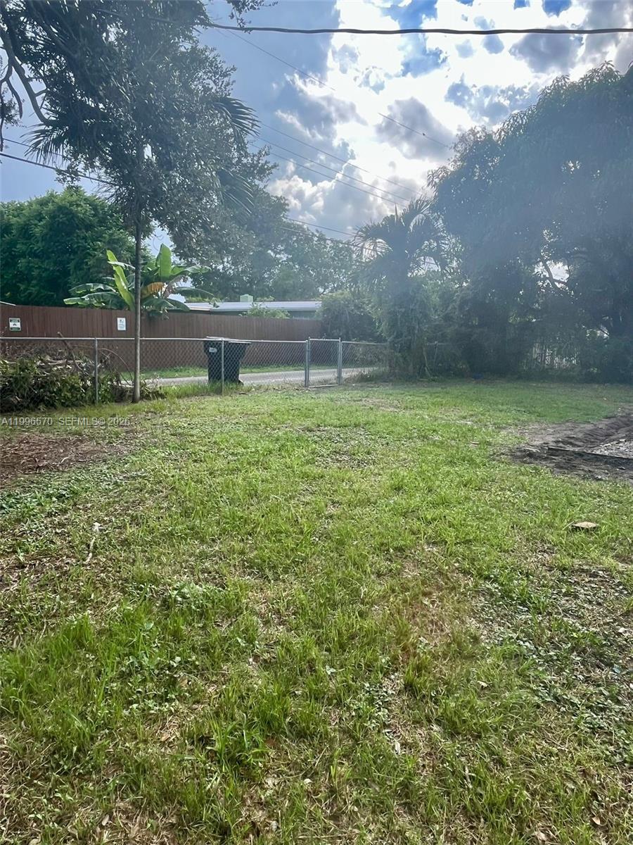 1776 Northeast 178th Street Miami, FL 33162 - Photo 15 of 18 a view of a backyard