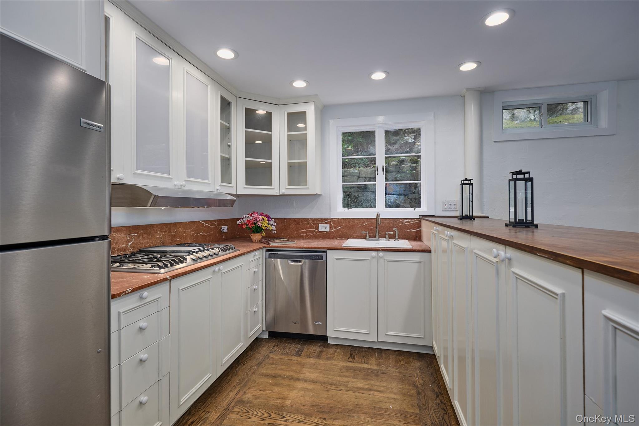 93 Circuit Road Tuxedo Park, NY 10987 - Photo 11 of 34 Kitchen with wooden counters, appliances with stainless steel finishes, recessed lighting, dark wood-style floors, and white cabinets