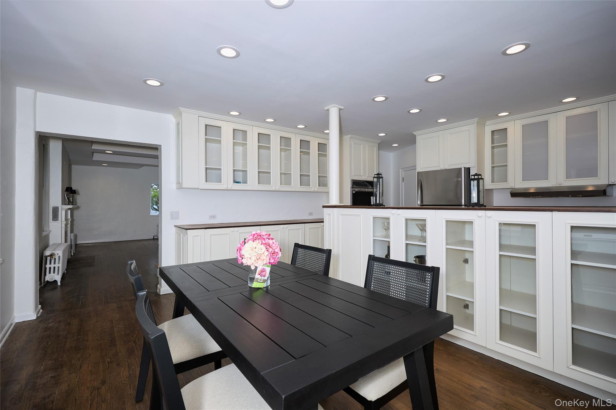 93 Circuit Road Tuxedo Park, NY 10987 - Photo 13 of 34 Dining area featuring dark wood-type flooring, recessed lighting, and radiator