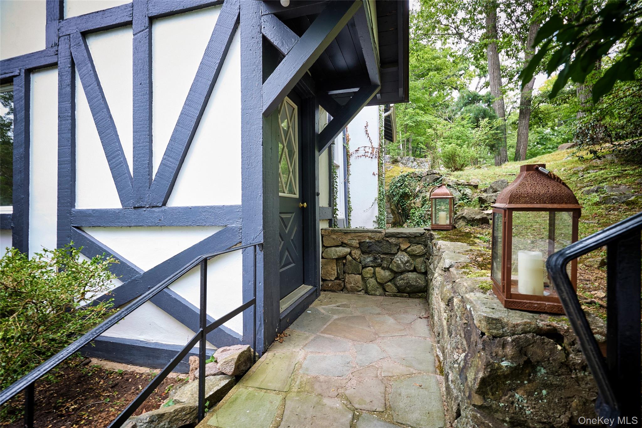 93 Circuit Road Tuxedo Park, NY 10987 - Photo 28 of 34 Entrance to property featuring stucco siding