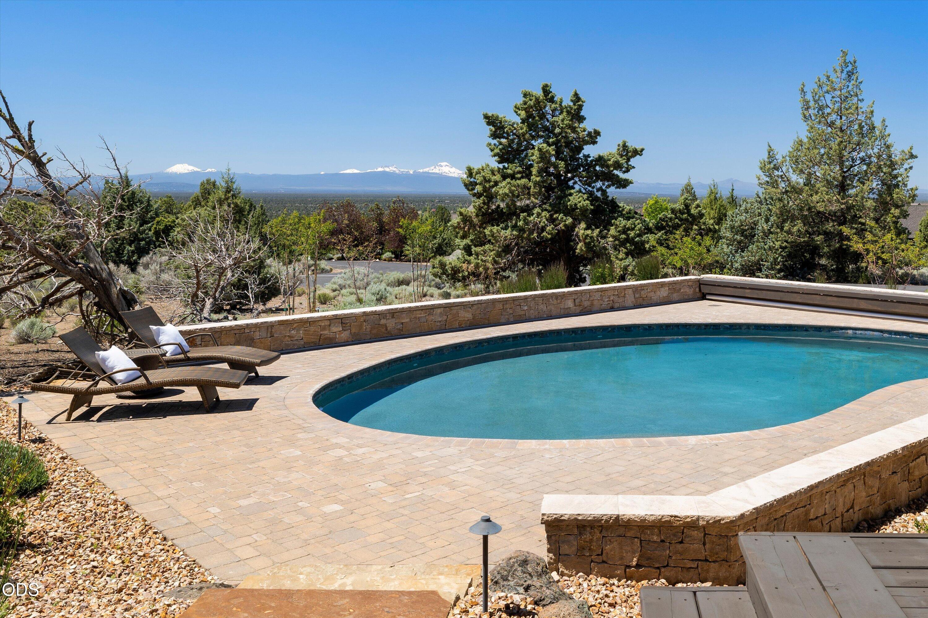 16215 South W Vaqueros Way Powell Butte, OR 97753 - Photo 41 of 48 World-class views from the pool and pool deck. Pool includes heater and electric cover