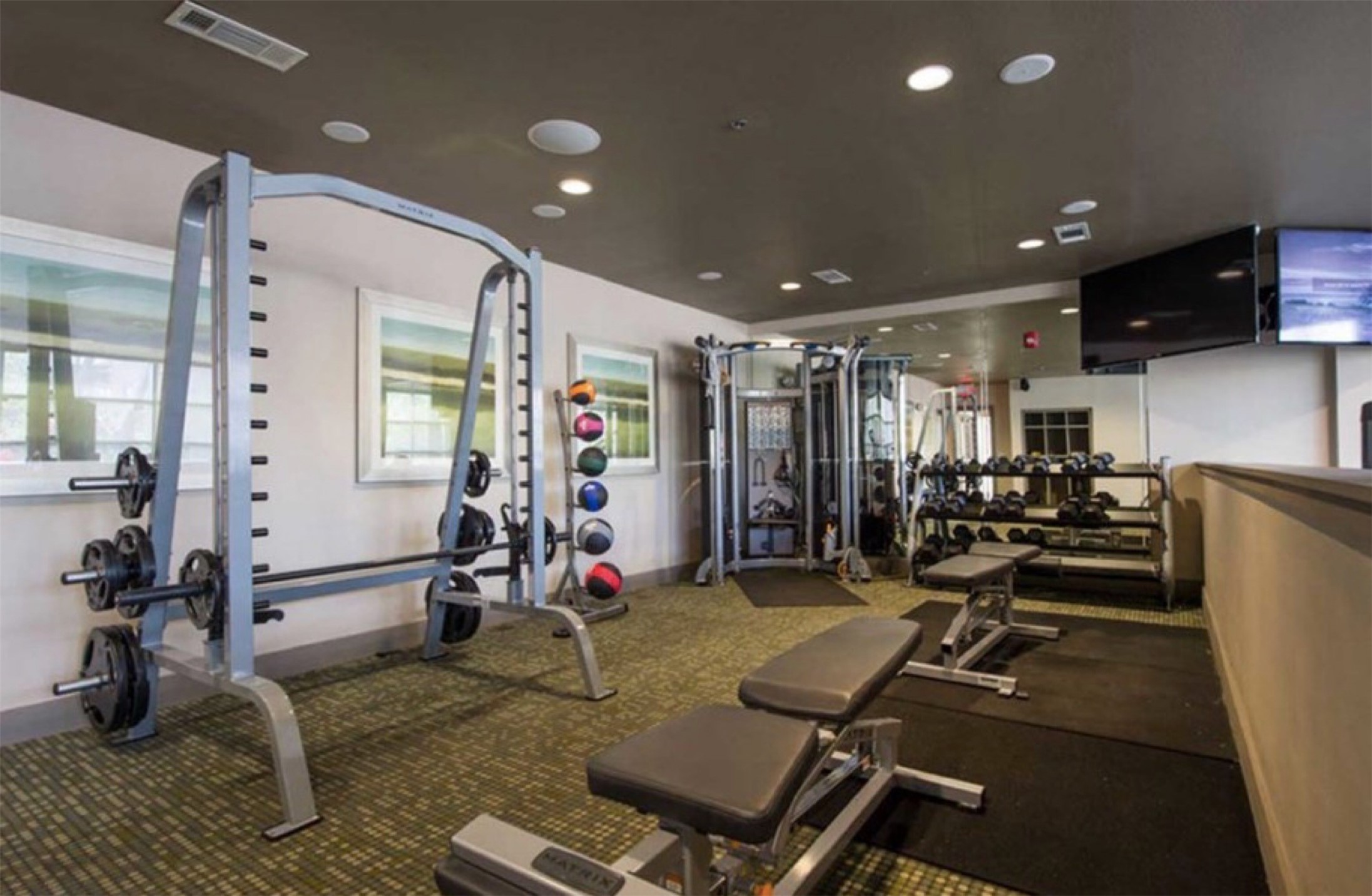 3333 Weslayan Street, Unit 1412 Houston, TX 77027 - Photo 11 of 20 a view of a room with gym equipment