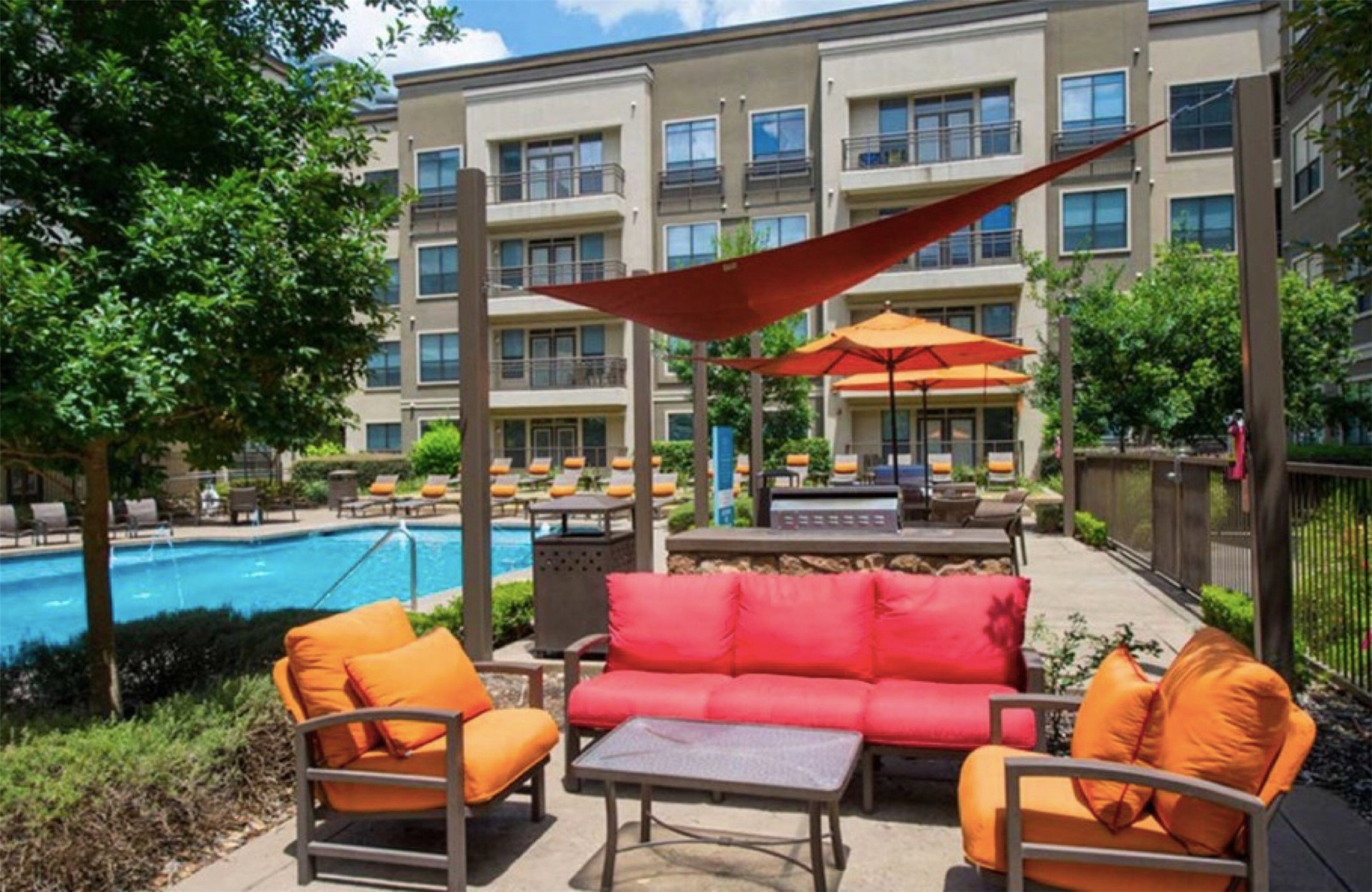 3333 Weslayan Street, Unit 1412 Houston, TX 77027 - Photo 16 of 20 a outdoor living space with patio furniture and a fire pit