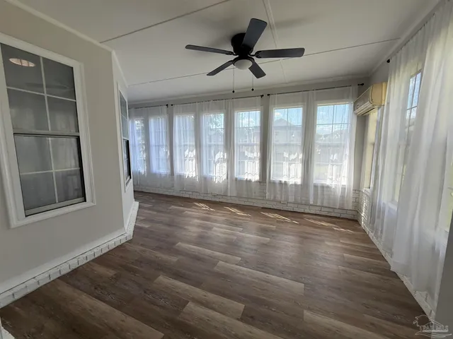a view of a kitchen with electric appliances
