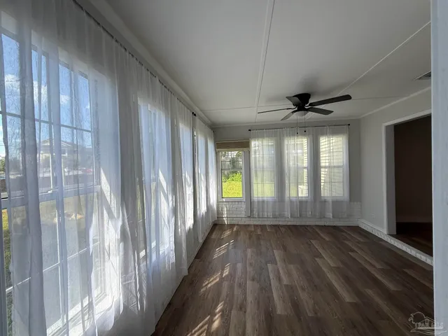 a kitchen with a stove a sink and a refrigerator