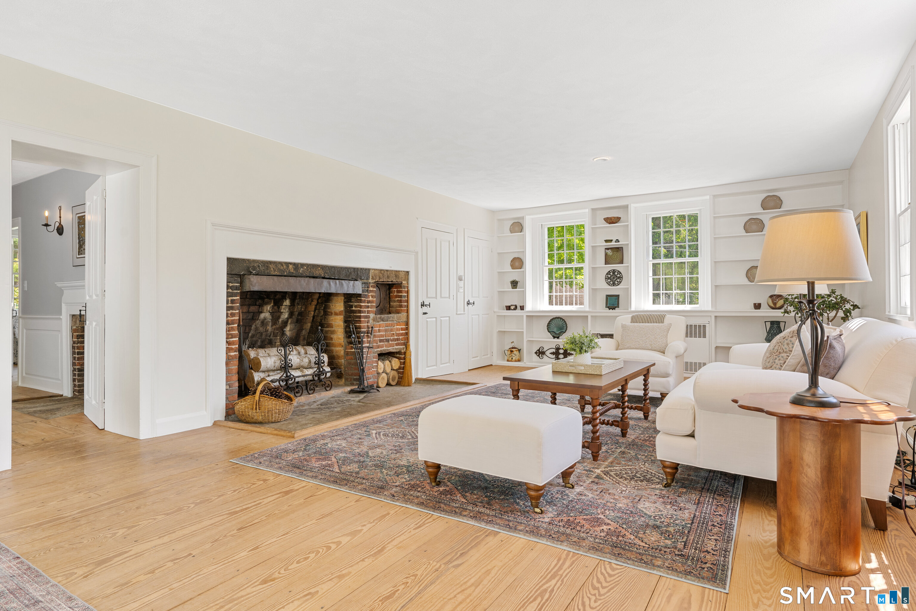 93 Upton Road Ashford, CT 06278 - Photo 7 of 40 Authentic character is exuded through multiple fireplaces, rich timber flooring, & period detailing.