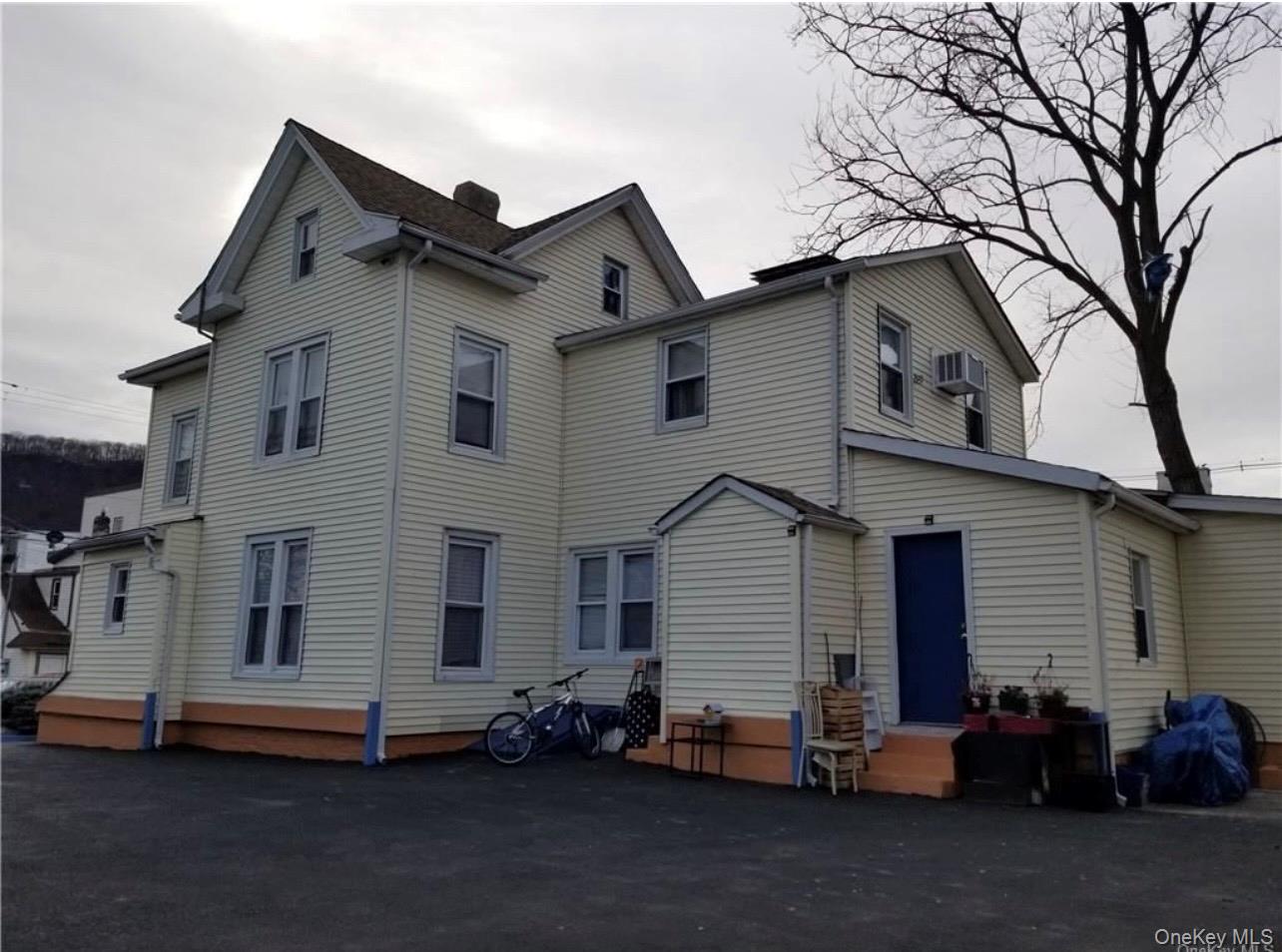 7 Clinton Street Haverstraw, NY 10927 - Photo 17 of 20 a view of a house with a yard and large tree