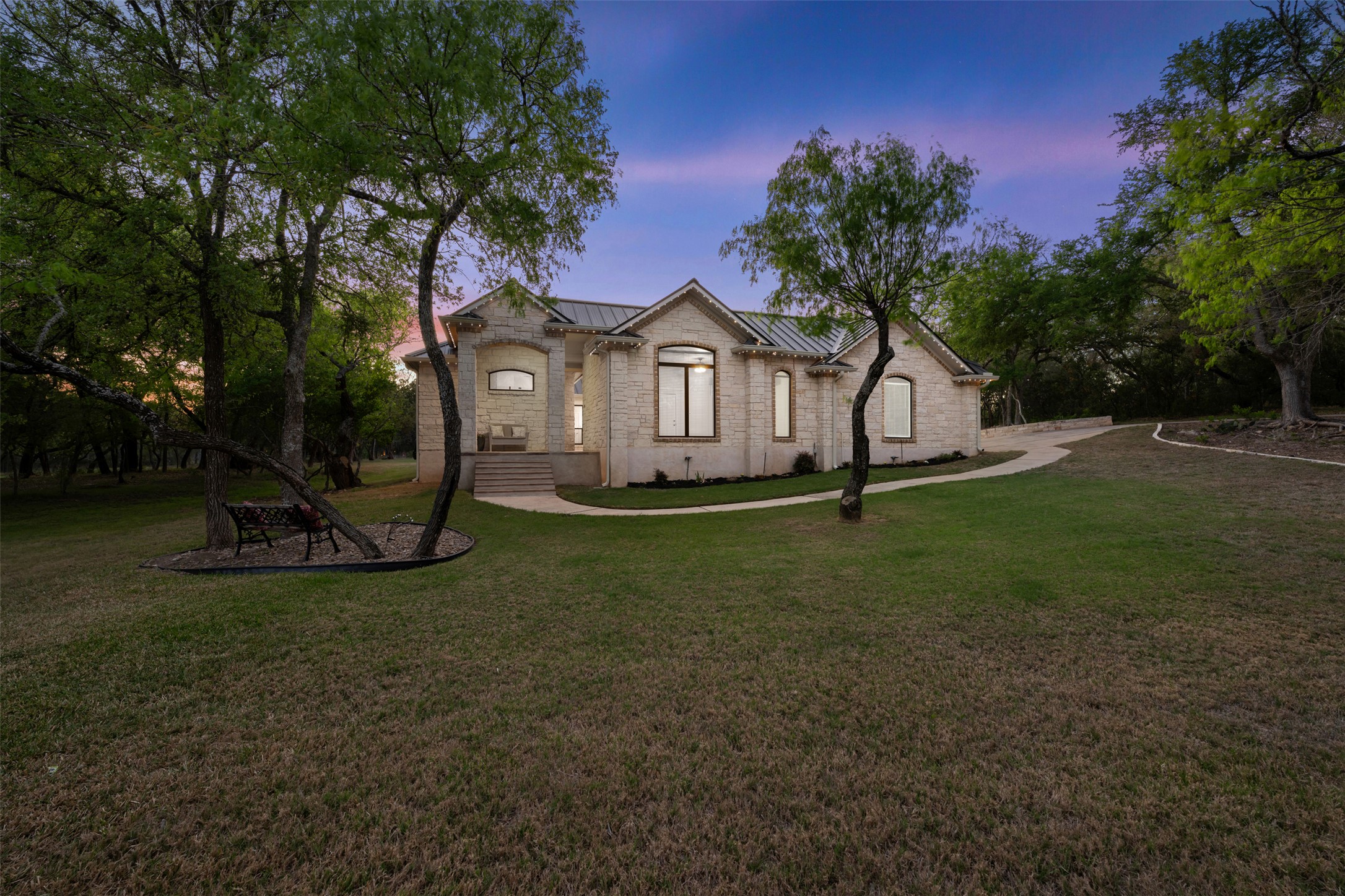181 Whitney Run Buda, TX 78610 - Photo 3 of 40 Lovely 4 bedroom home on 1.75 private & wooded acres in highly desirable gated enclave of Buda.