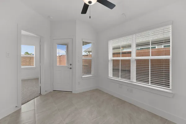 a view of a hallway with a big yard