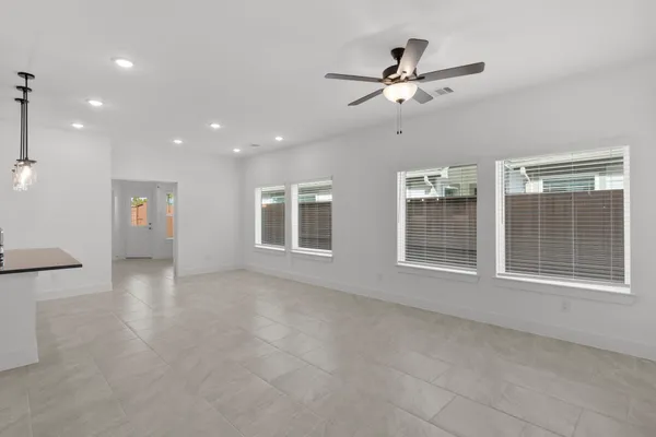 a kitchen with a refrigerator stove and microwave