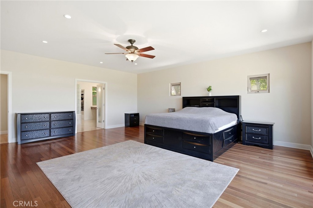 1186 Lydia Lane Fallbrook, CA 92028 - Photo 38 of 68 a living room with furniture and wooden floor