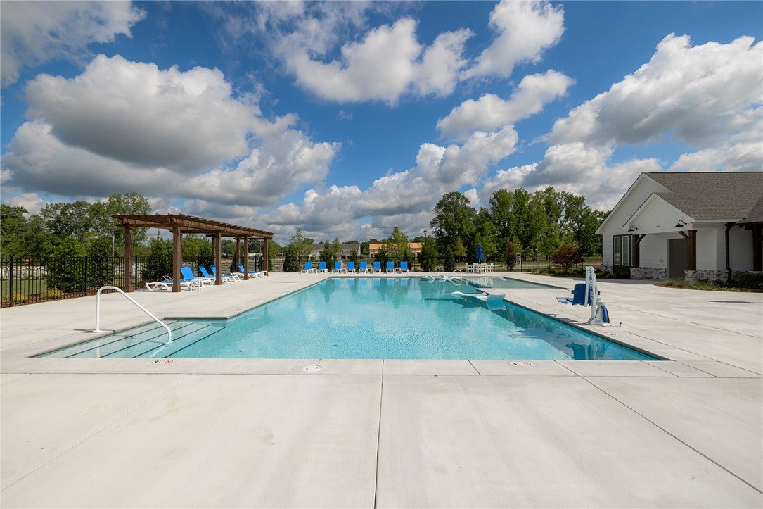 320 Coscoroba Road Auburn, AL 36832 - Photo 22 of 27 Relax poolside under the pergolas, enjoying a refreshing dip in this inviting community pool.
