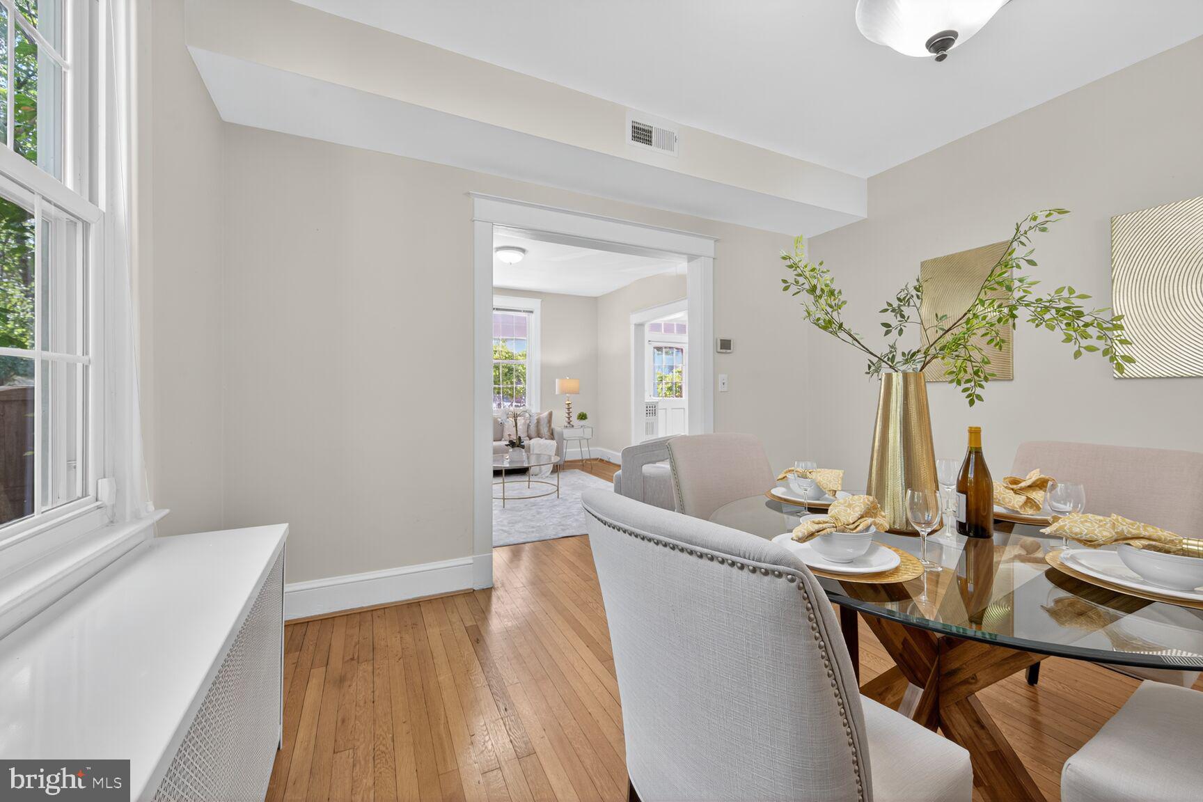 4209 Ellicott Street Northwest Washington, DC 20016 - Photo 11 of 33 a living room with furniture and wooden floor