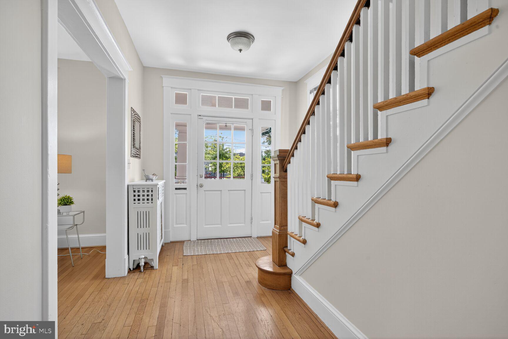 4209 Ellicott Street Northwest Washington, DC 20016 - Photo 15 of 33 a view of entryway with wooden floor and stairs