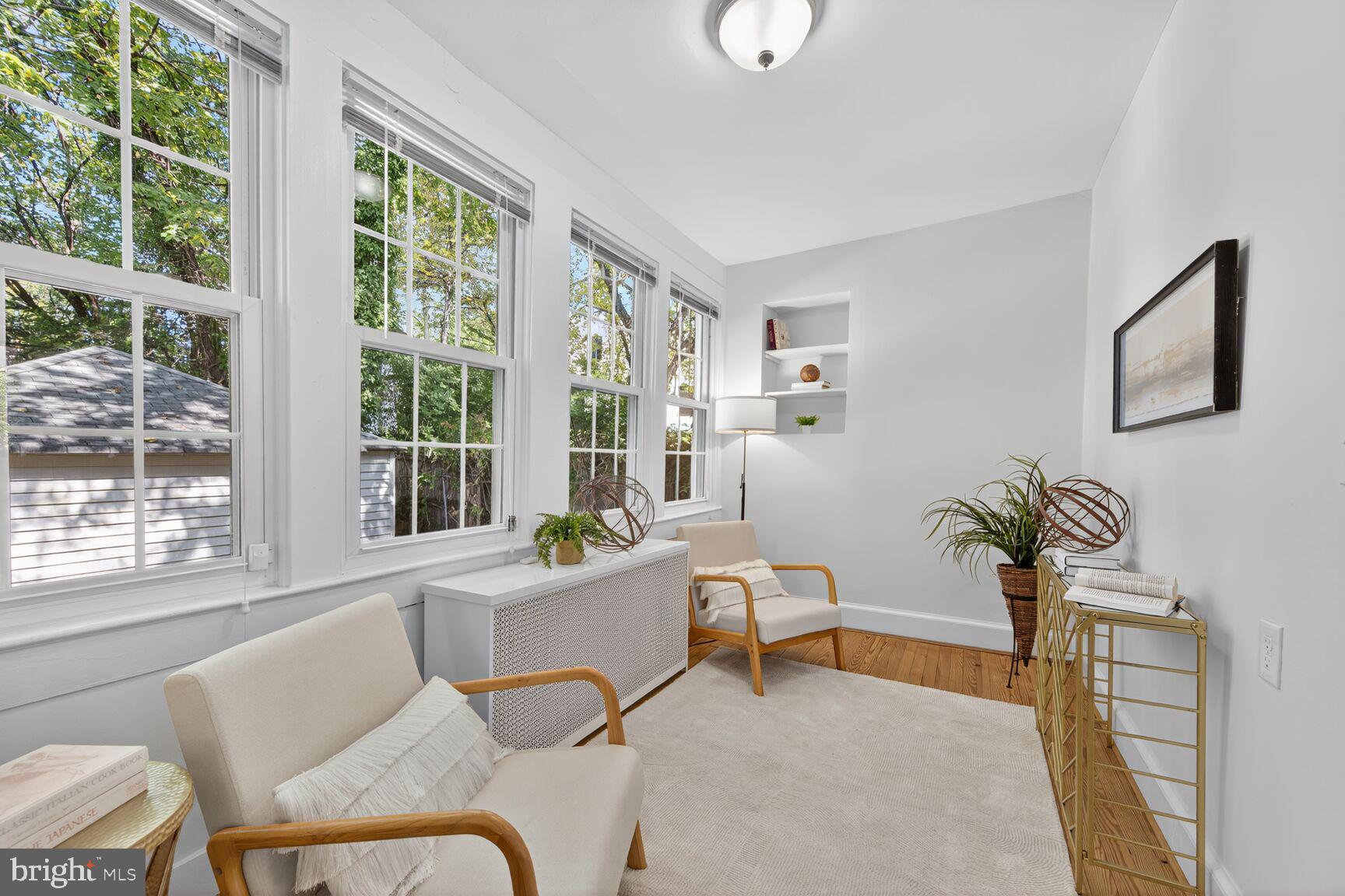 4209 Ellicott Street Northwest Washington, DC 20016 - Photo 16 of 33 a living room with furniture and a large window