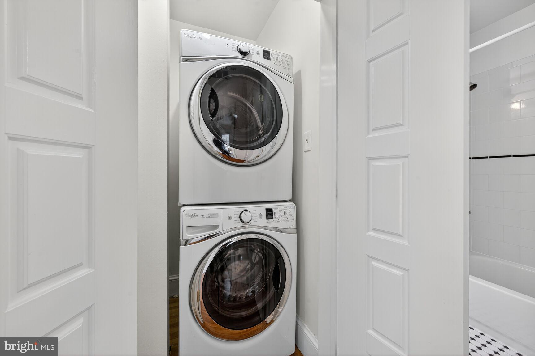 4209 Ellicott Street Northwest Washington, DC 20016 - Photo 18 of 33 a utility room with dryer and washer