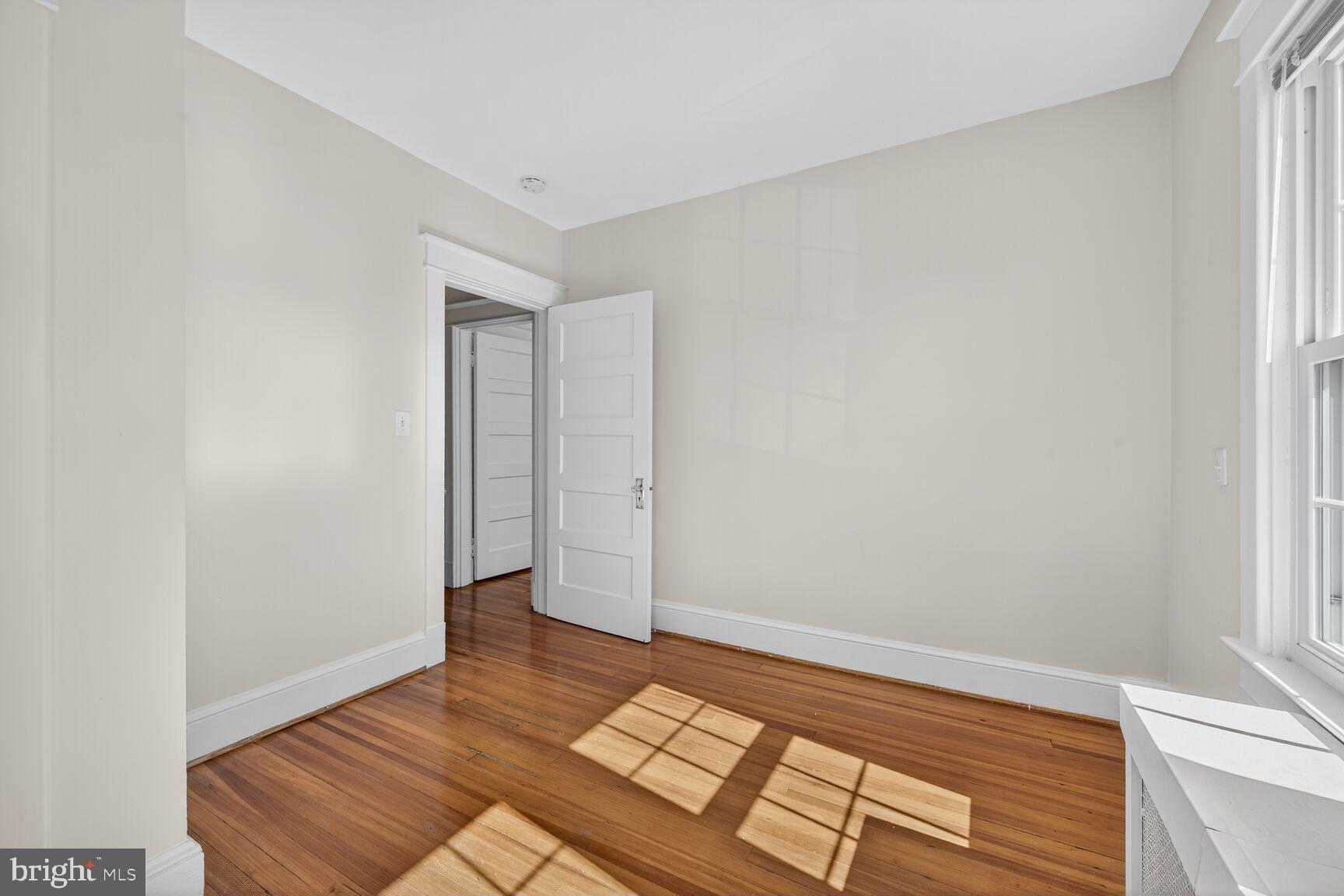 4209 Ellicott Street Northwest Washington, DC 20016 - Photo 30 of 33 a view of an empty room and window