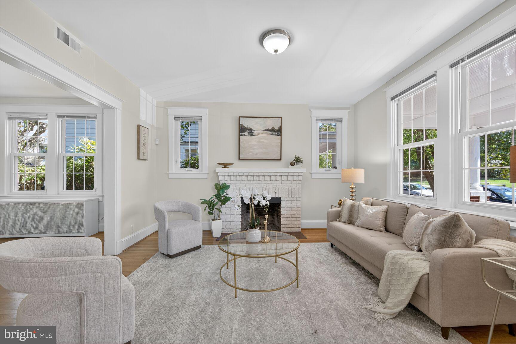 4209 Ellicott Street Northwest Washington, DC 20016 - Photo 6 of 33 a living room with furniture and a large window