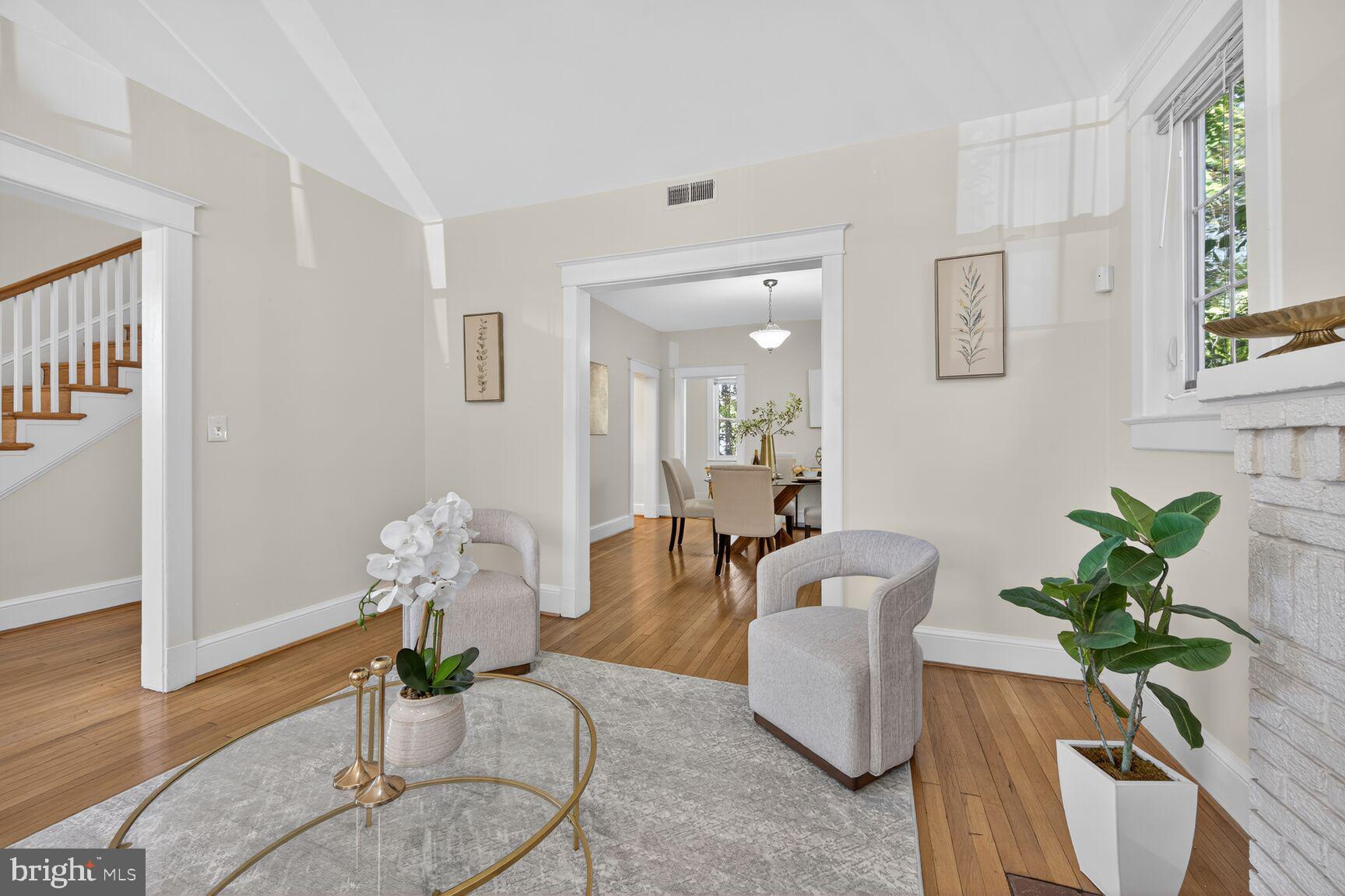 4209 Ellicott Street Northwest Washington, DC 20016 - Photo 8 of 33 a living room with furniture flowerpot and wooden floor