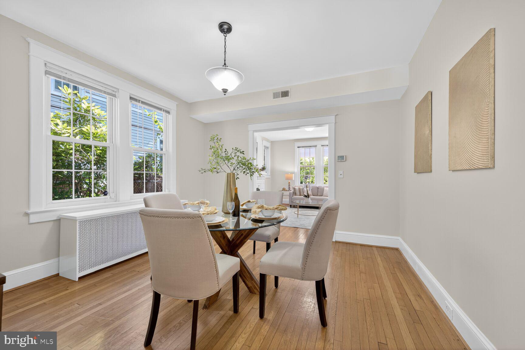4209 Ellicott Street Northwest Washington, DC 20016 - Photo 10 of 33 a view of a dining room with furniture window and wooden floor