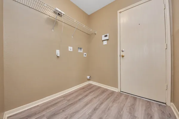 a view of small space with wooden floor