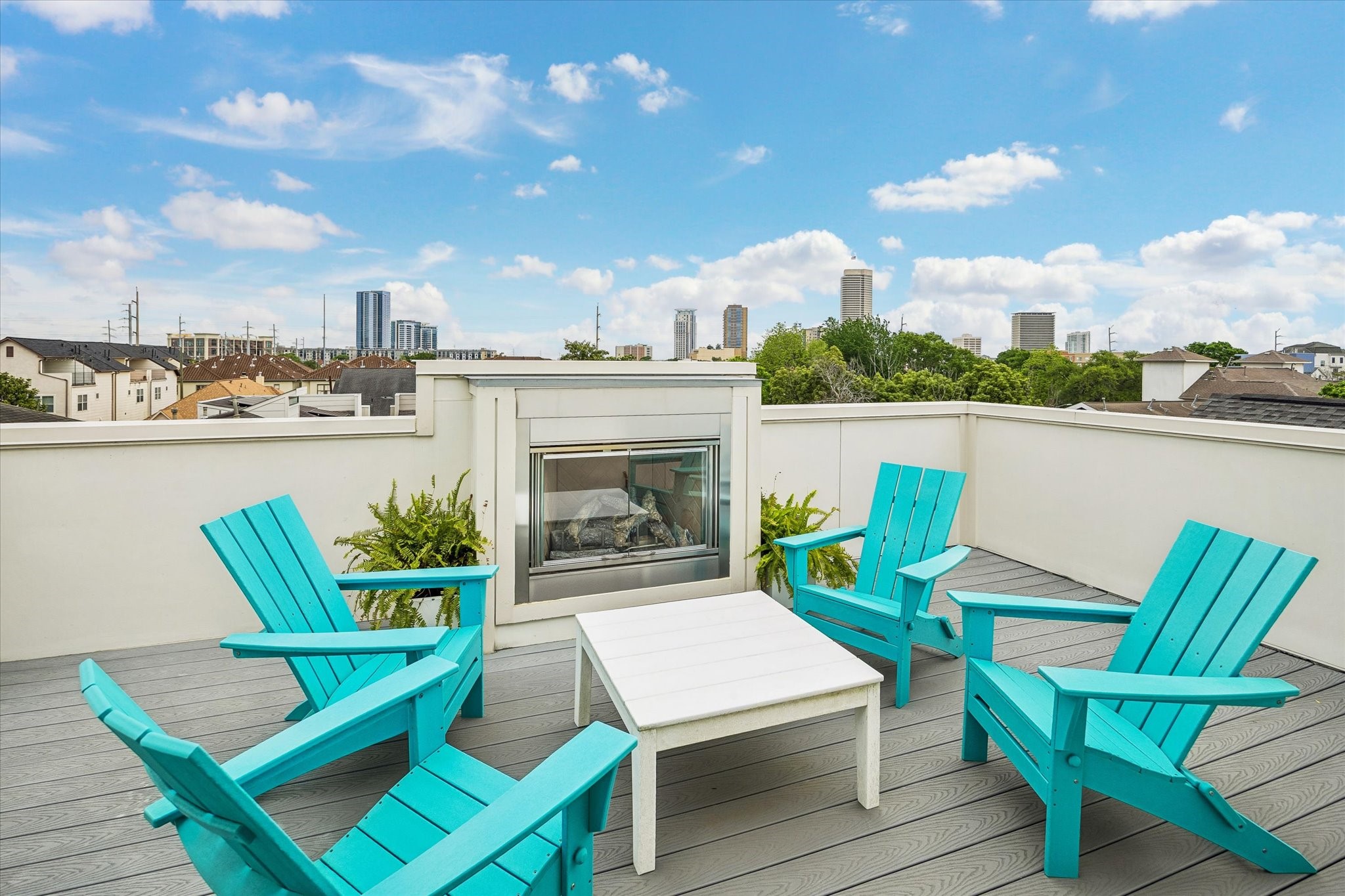 1526 Vermont Street Houston, TX 77006 - Photo 37 of 39 Rooftop terrace with fireplace and skyline views creates an exceptional setting for outdoor entertaining.