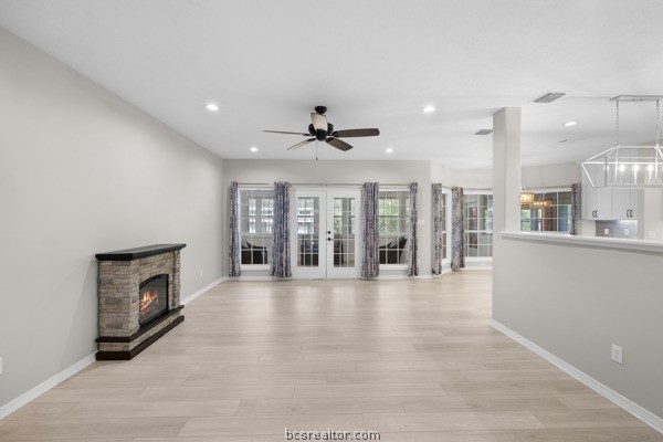 12 Raven's Nest Bryan, TX 77808 - Photo 7 of 46 a view of an empty room with a fireplace and a window