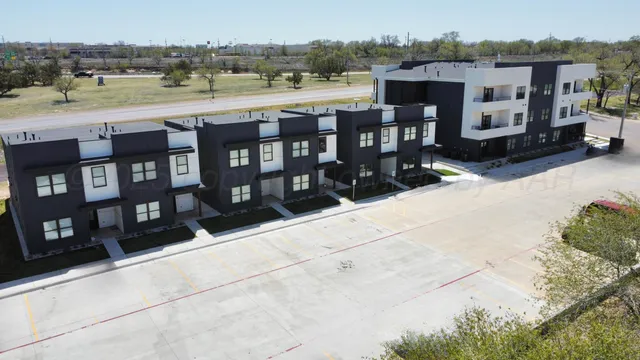 a view of a lake with a building and city view