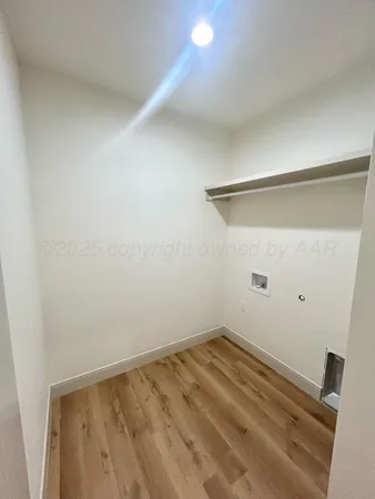 a view of a room with an empty space