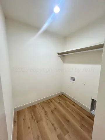 a view of a room with an empty space