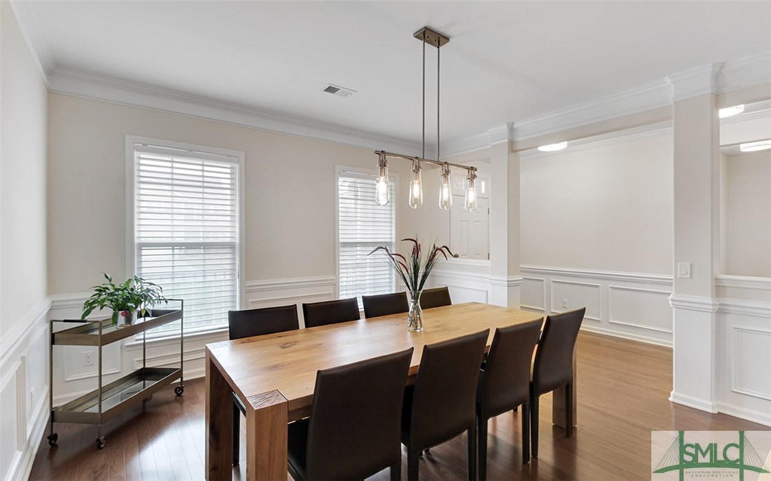 602 Wyndham Way Pooler, GA 31322 - Photo 4 of 30 Formal dining room with wood floors, crown molding
