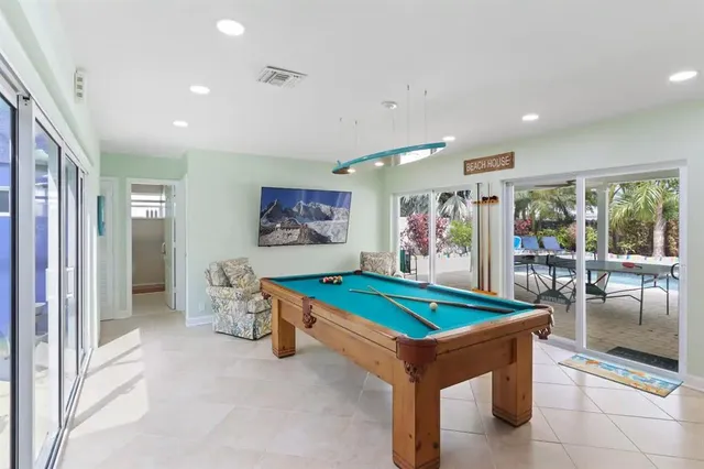 a room with table and chairs