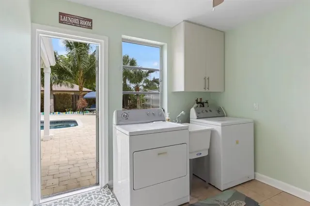 an aerial view of a house with outdoor space