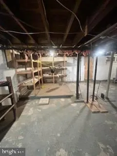 a view of an empty room with storage