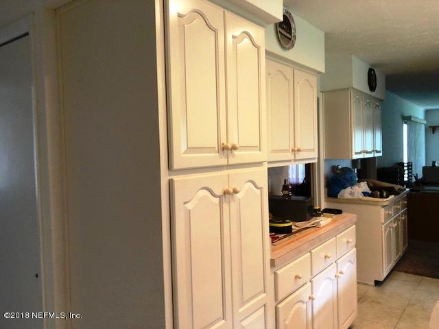 730 North Park Street Crescent City, FL 32112 - Photo 15 of 31 a view of a kitchen with a sink