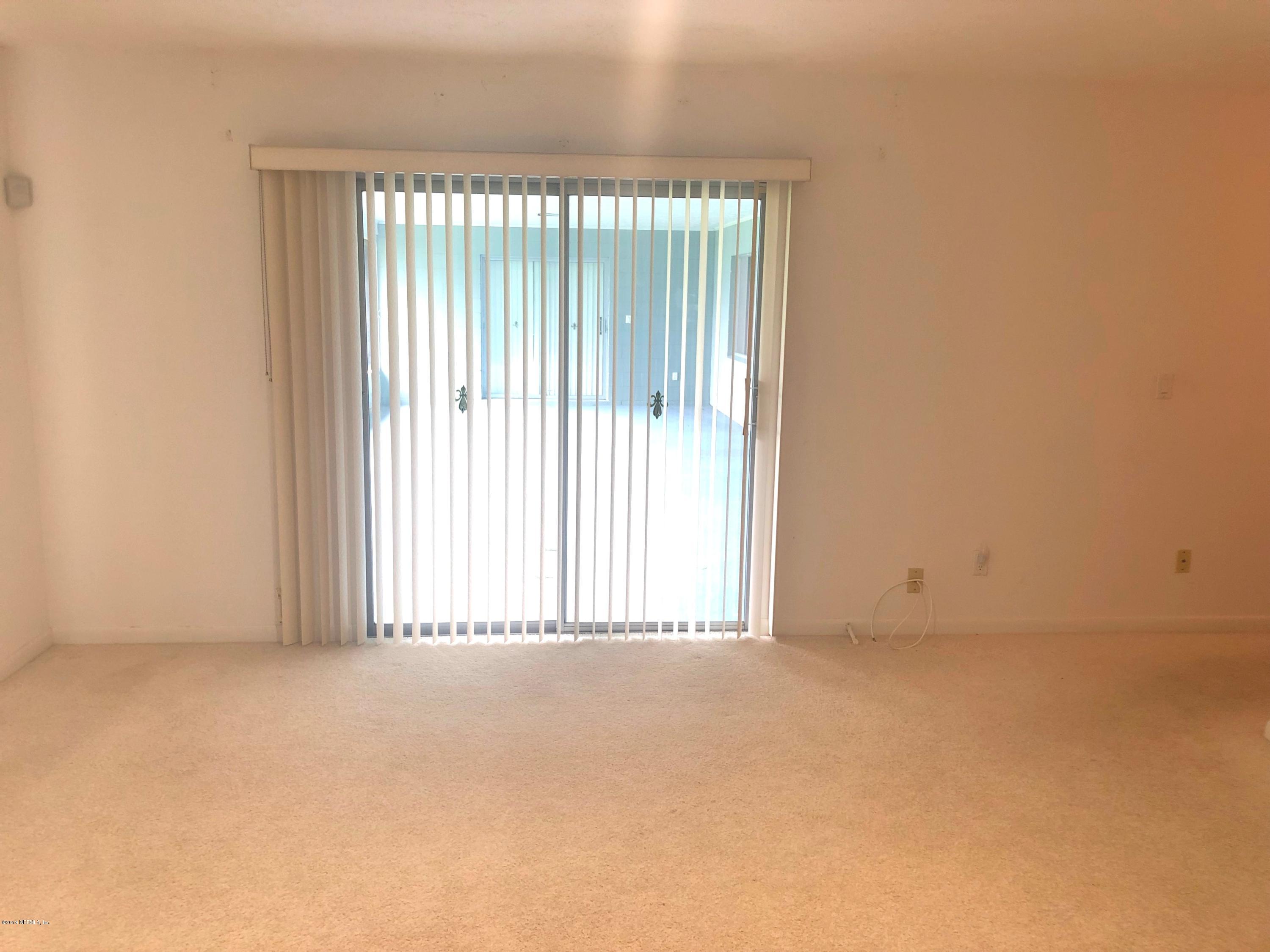 730 North Park Street Crescent City, FL 32112 - Photo 18 of 31 a view of an empty room with a window