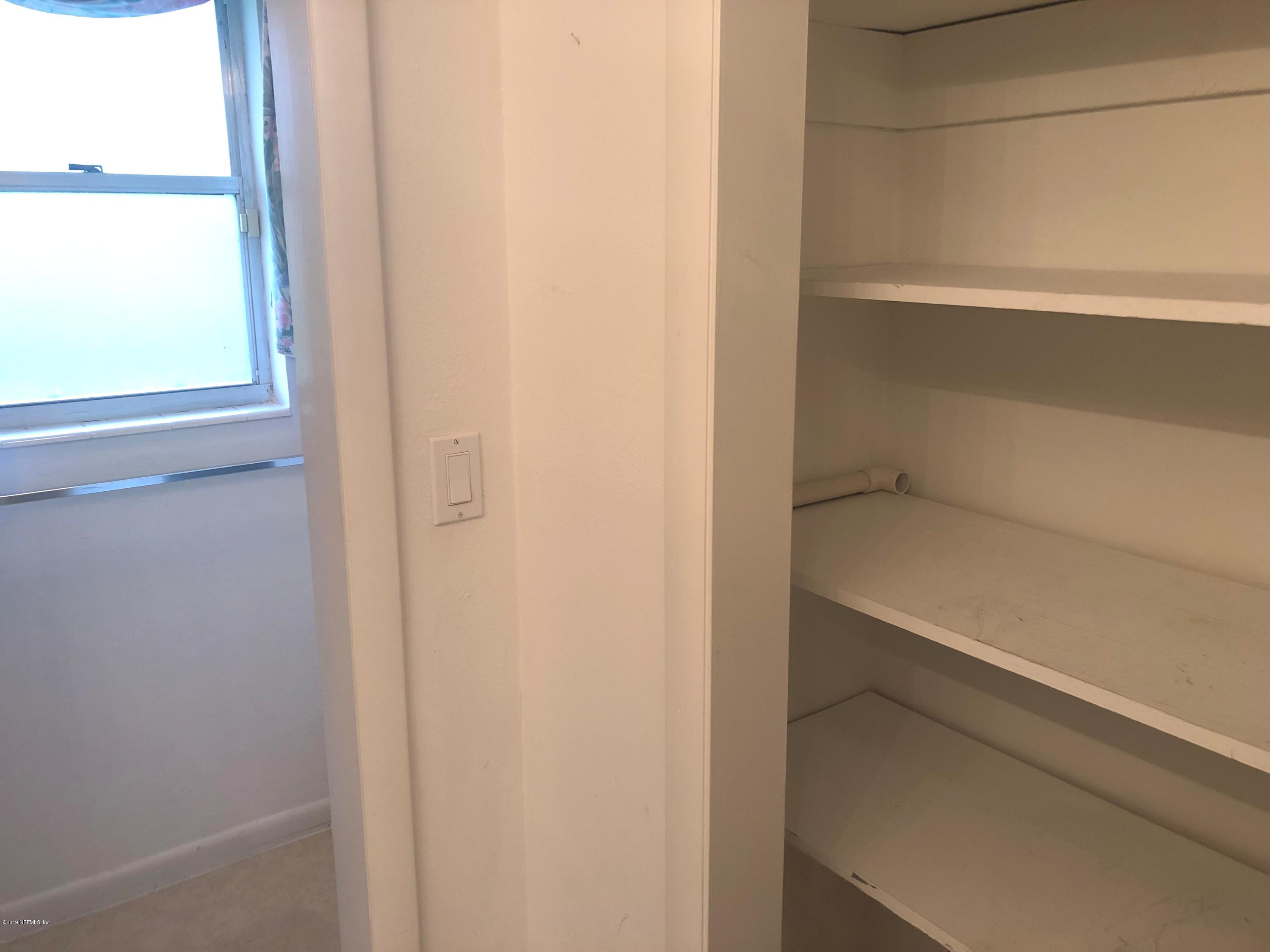 730 North Park Street Crescent City, FL 32112 - Photo 20 of 31 a view of an empty walk in closet