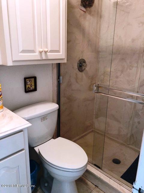 730 North Park Street Crescent City, FL 32112 - Photo 26 of 31 a bathroom with a toilet and a sink