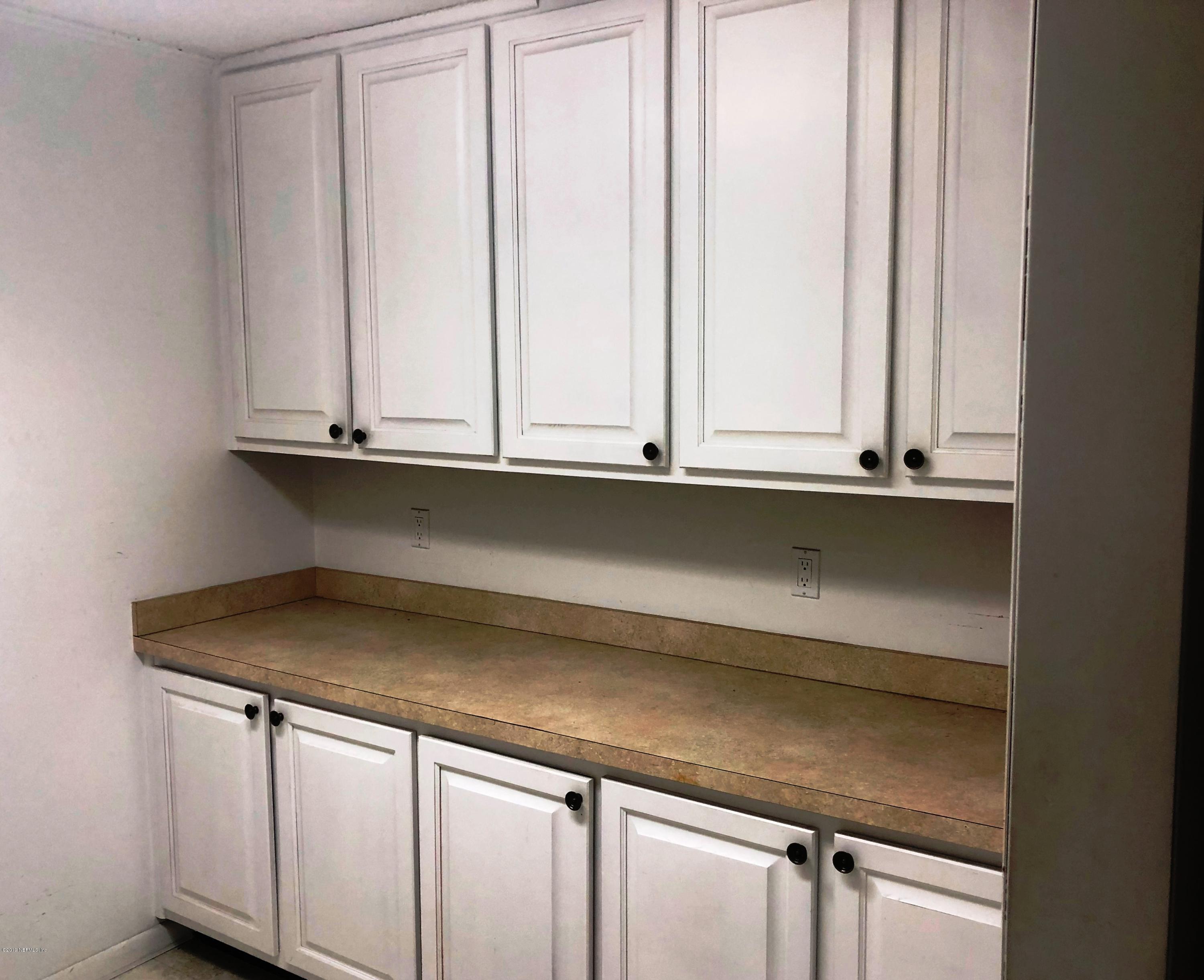 730 North Park Street Crescent City, FL 32112 - Photo 27 of 31 a close view of sink and cabinets