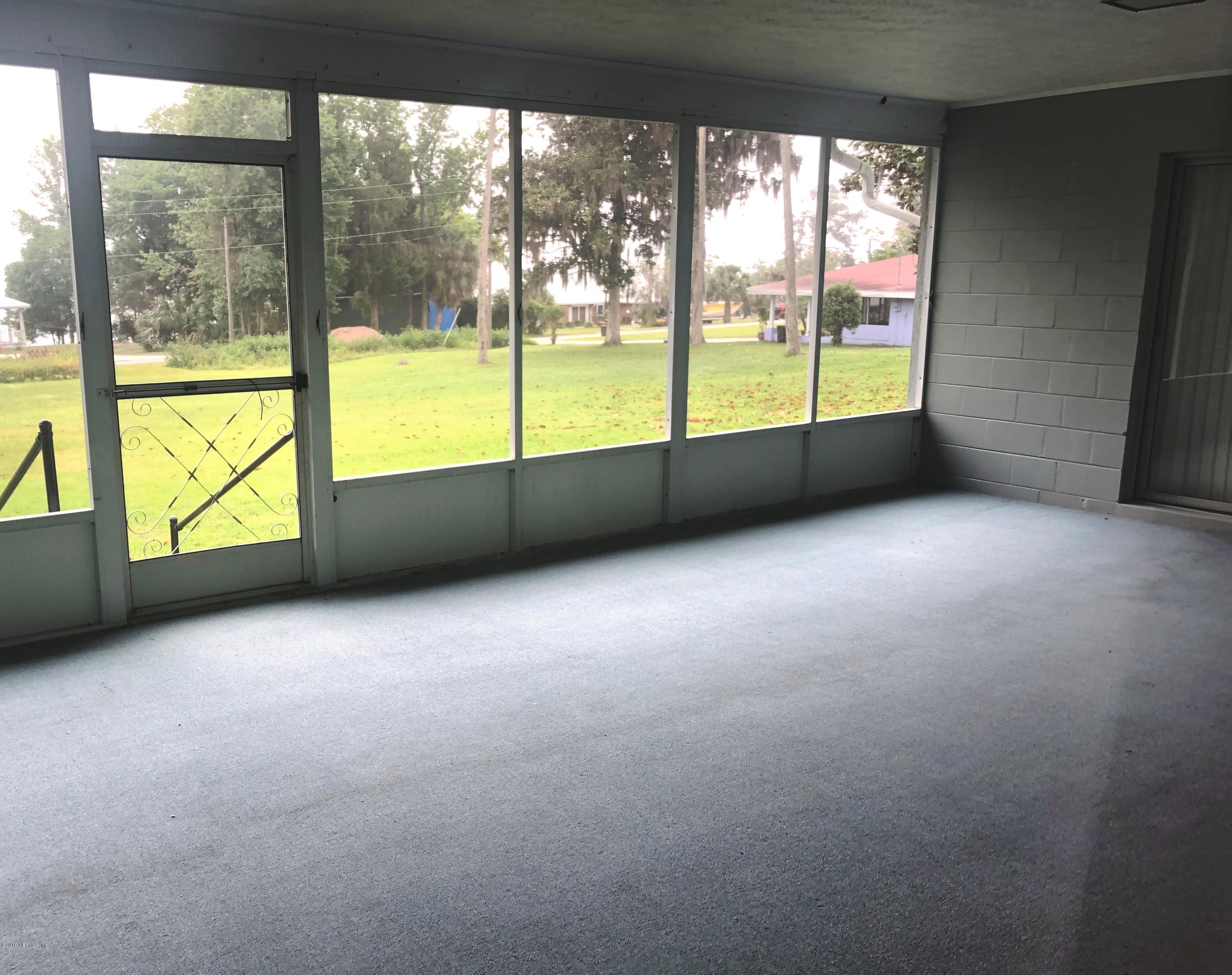 730 North Park Street Crescent City, FL 32112 - Photo 29 of 31 a view of an empty room with a large window