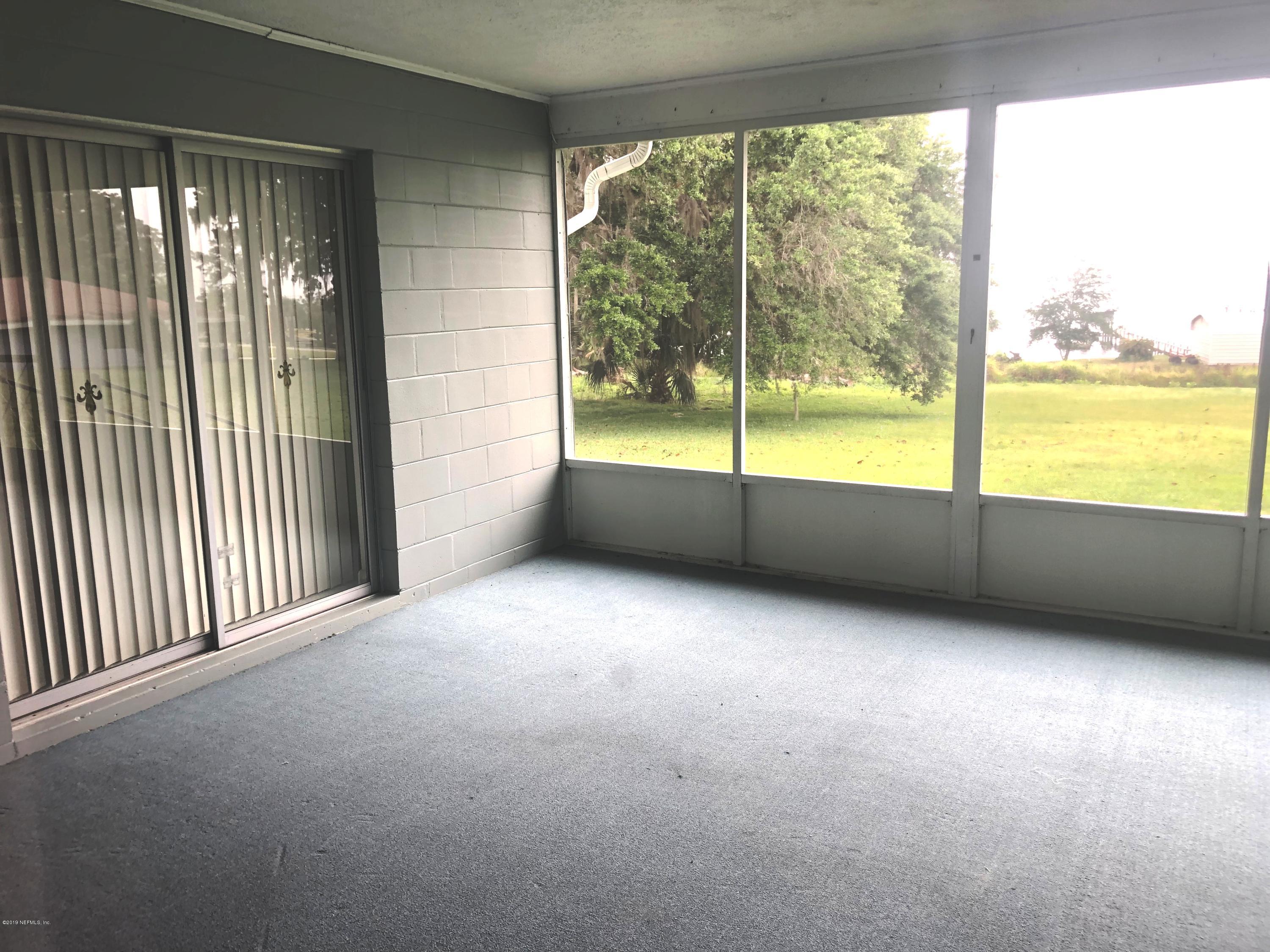 730 North Park Street Crescent City, FL 32112 - Photo 30 of 31 a view of an empty room with a large window