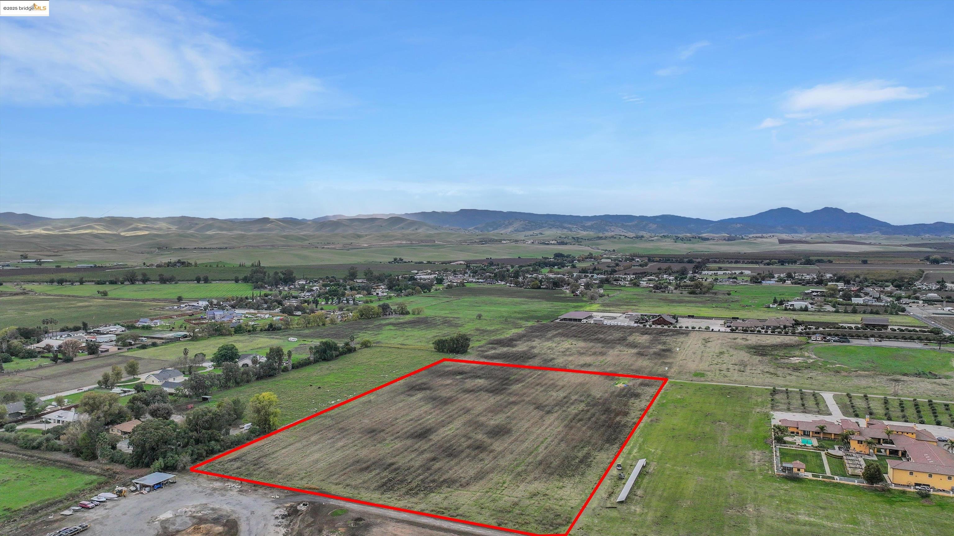 3590 Byer Road Byron, CA 94514 - Photo 12 of 12 Overview of rural landscape featuring property parcel outlined and a mountainous background