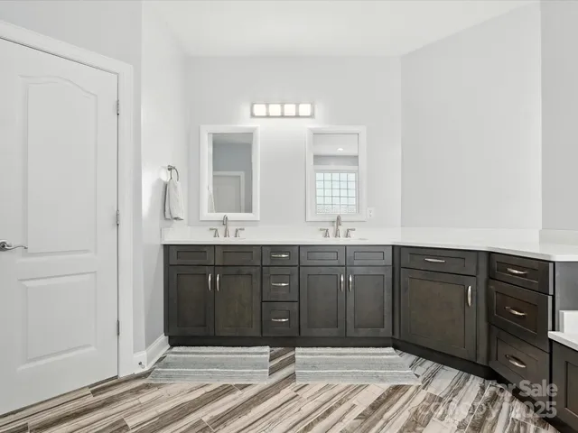 a work room with furniture and a window