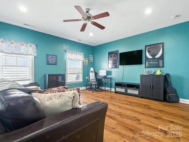 a view of a tree in a yard