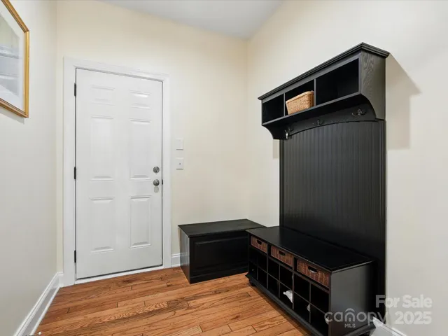an aerial view of a house with a swimming pool
