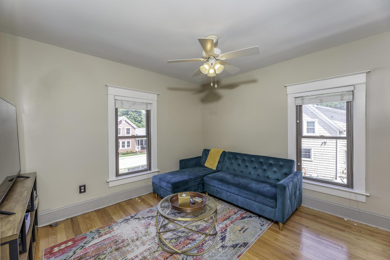 507 Center Street Michigan City, IN 46360 - Photo 12 of 42 a living room with furniture and a window