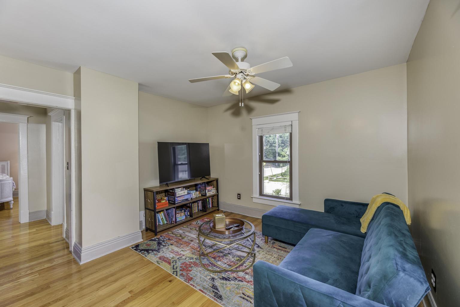 507 Center Street Michigan City, IN 46360 - Photo 13 of 42 a living room with furniture and a flat screen tv