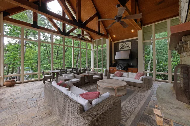 a view of a patio with couches and chairs