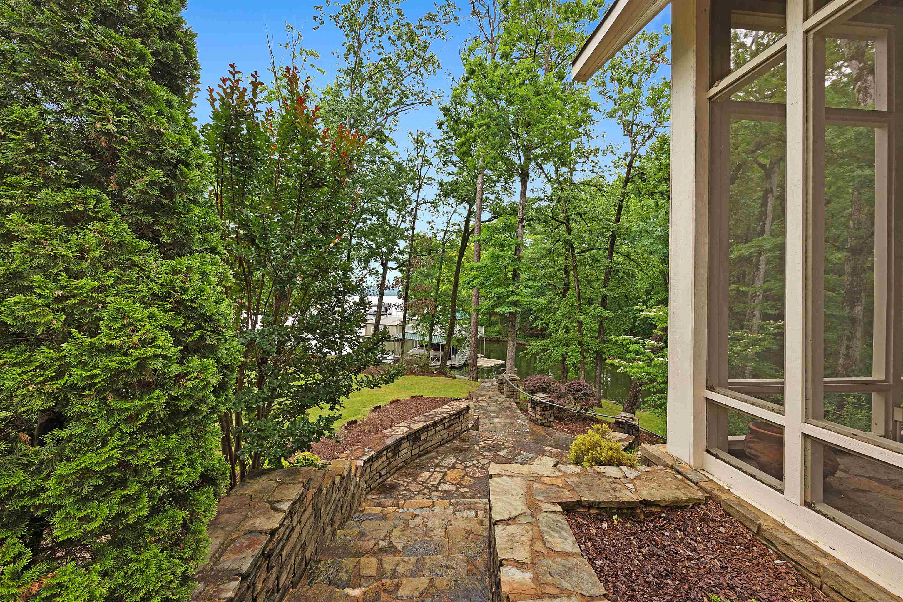25 Caney Hollow Road Counce, TN 38326 - Photo 15 of 40 a view of a backyard with sitting area