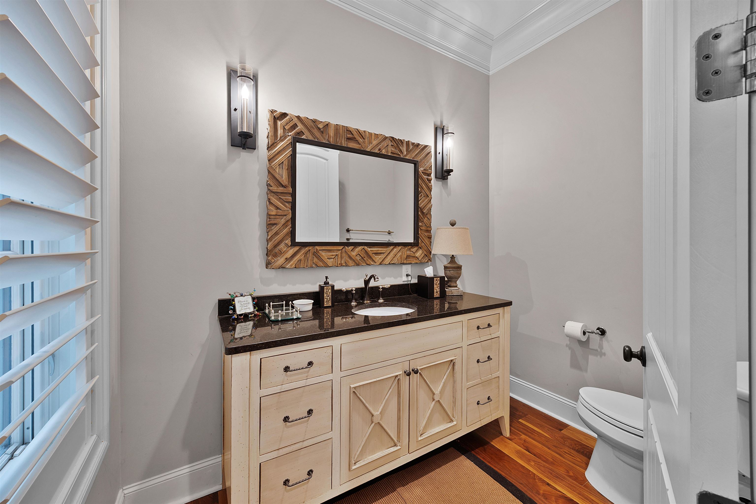 25 Caney Hollow Road Counce, TN 38326 - Photo 20 of 40 a bathroom with a double vanity sink and mirror